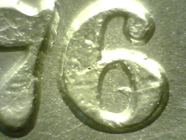 1876-Liberty-Seated-Quarter-Over-Date?
