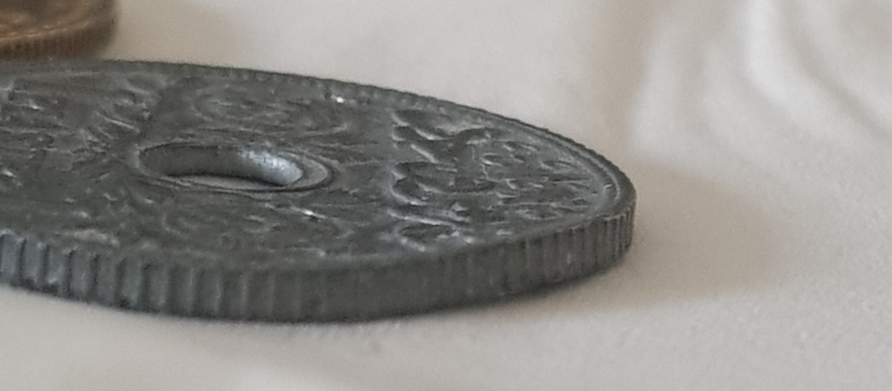 What-Make--A-Coin-In-This-Condition-?-Raised-Side
