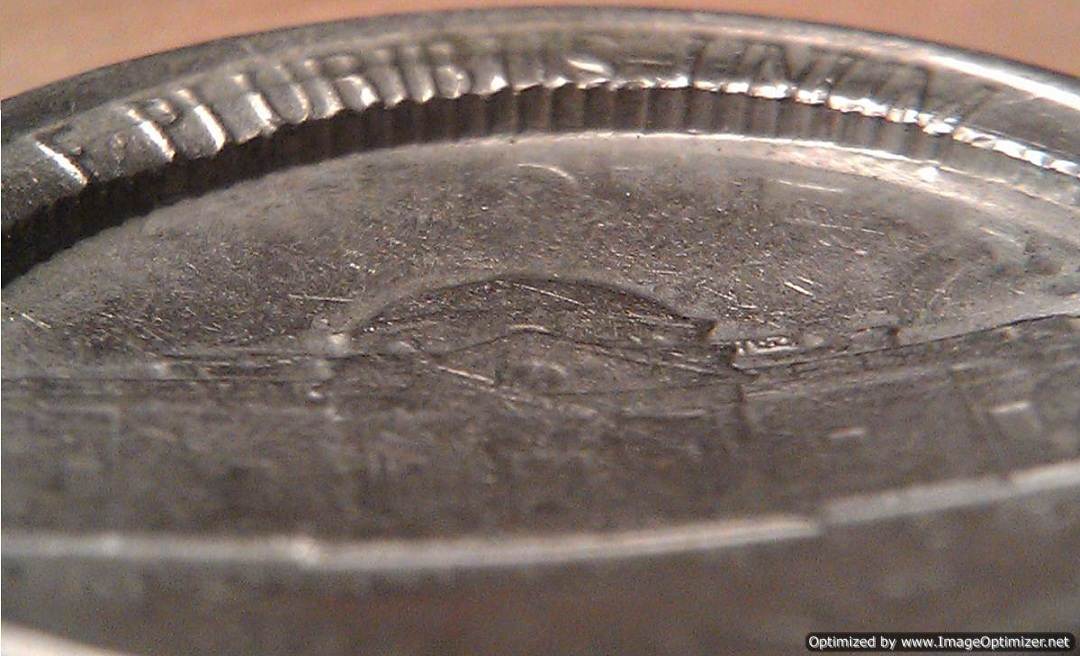 1980-Nickle---Capped-Over-Dime?
