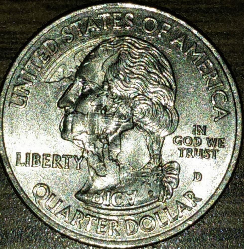 2009-D.-Of-C.-Quarter-Error-Coin-Or-Fake?