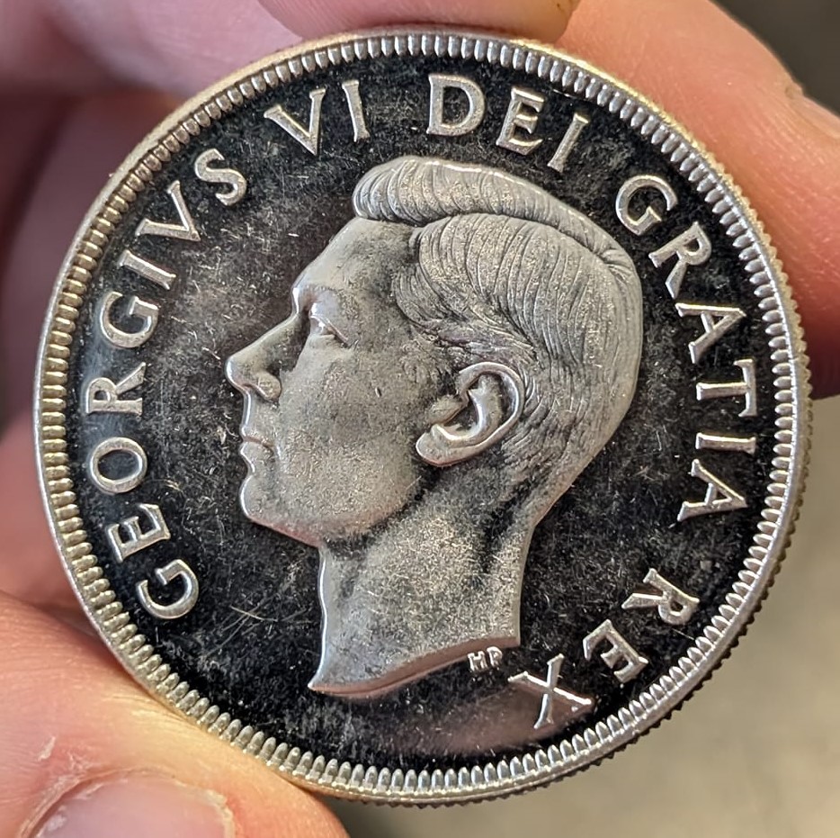 1950-Dollar:-Is-This-Considered-A-Cameo-Coin?-Grade-Please.