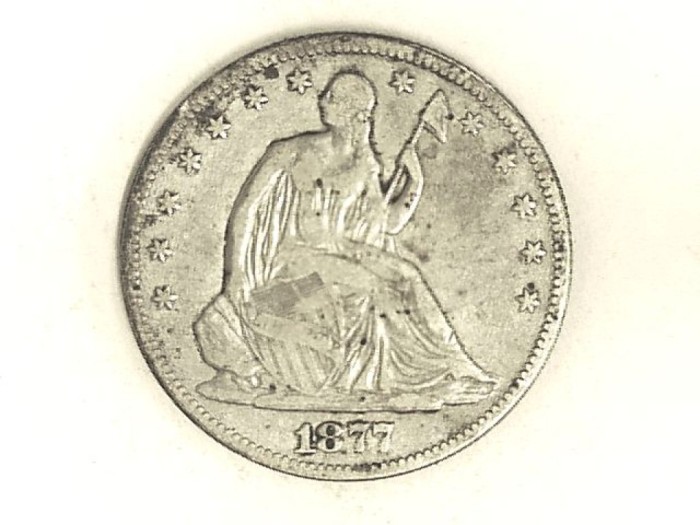 Grade-On-1877-Seated-Half