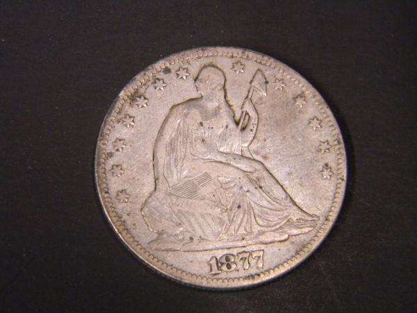 Grade-On-1877-Seated-Half