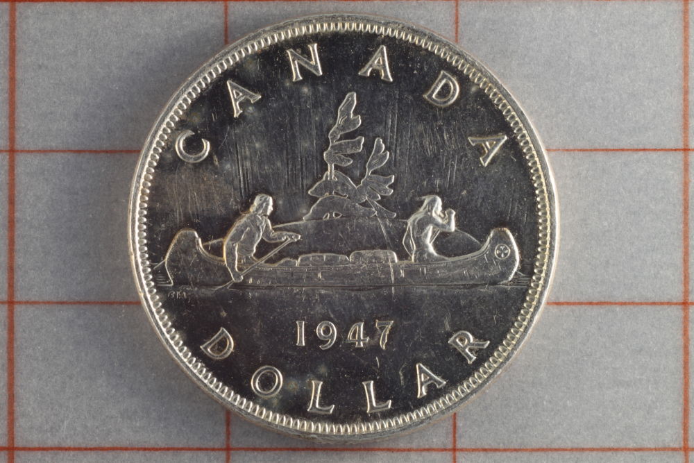1947--Silver-Dollar,-Pointed-7,-Quad-