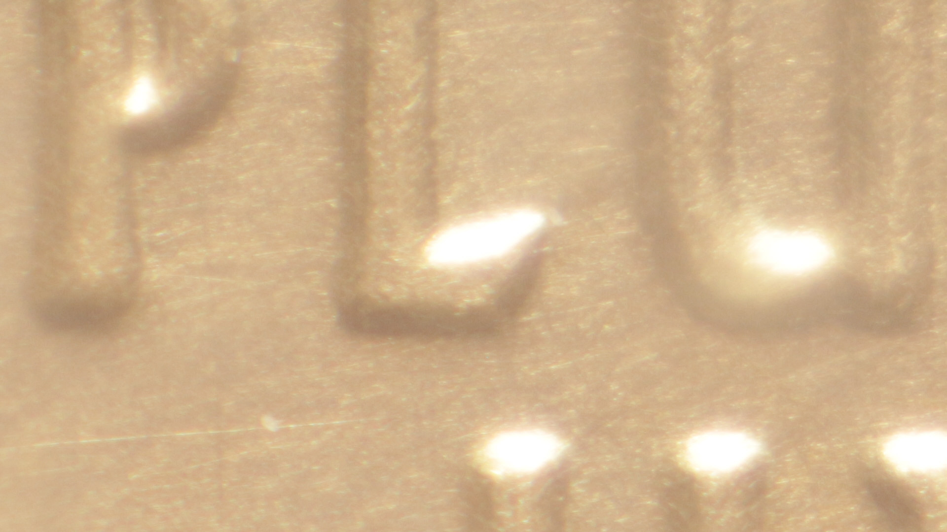 2015-$100-Gold-Liberty-Die-Scratches
