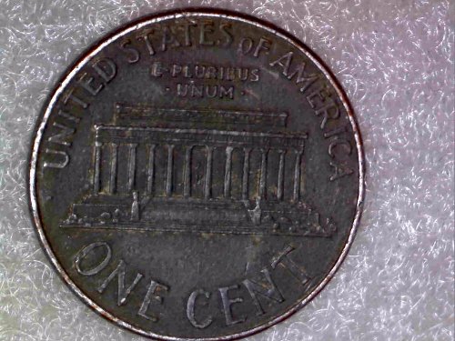 1999-Lincoln-Penny,-Missing-Copper-Layer-On-Obverse-And-Reverse?