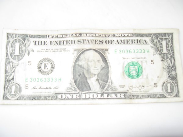 One-Dollar-Bill,-S/S-Flipper-And-Four-Threes-?