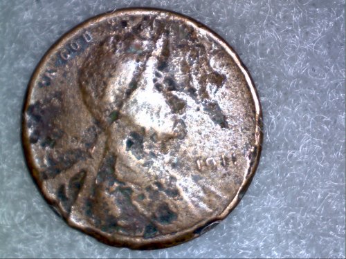 1911-Wheat-Cent,-PMD-Or-Corrosion?