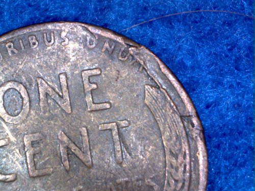 1944-Wheat-Cent,-Post-Mint-Damage?