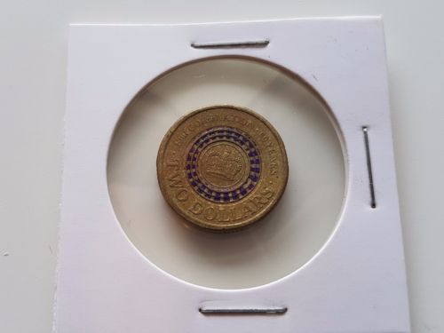 Queen's-Head-Replaced-On-This-2013-$2-Purple-Coronation-Coin?