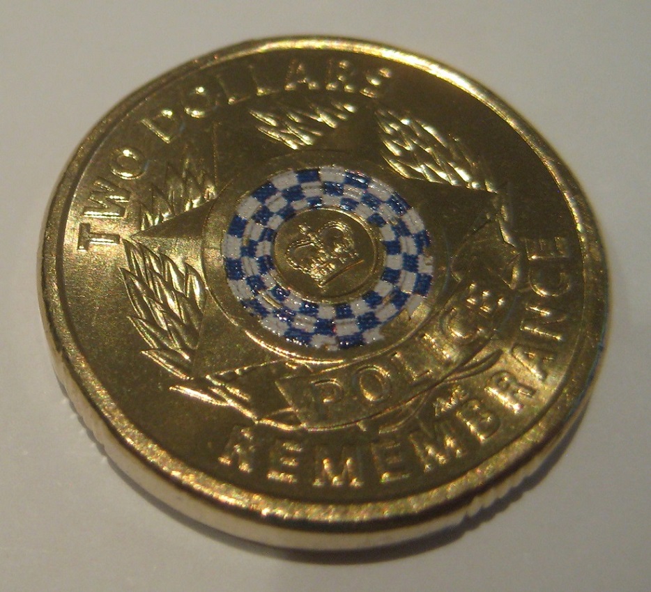 Missing-Ring-On-$2-Police-Remembrance-Coin?