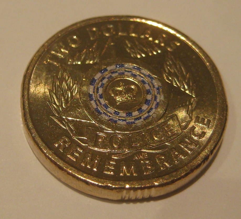Missing-Ring-On-$2-Police-Remembrance-Coin?