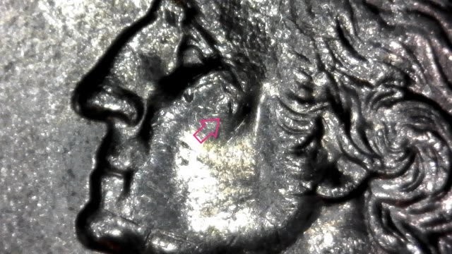 1997-P-Quarter---Lots-Going-On-On-Obverse?-Motto,-Eye,-Back-Of-Head?