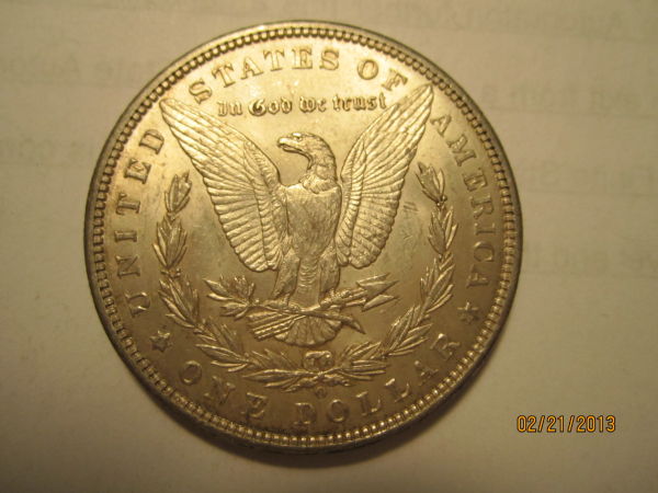 1896-O-Morgan-And-1934-D-Peace-Grades