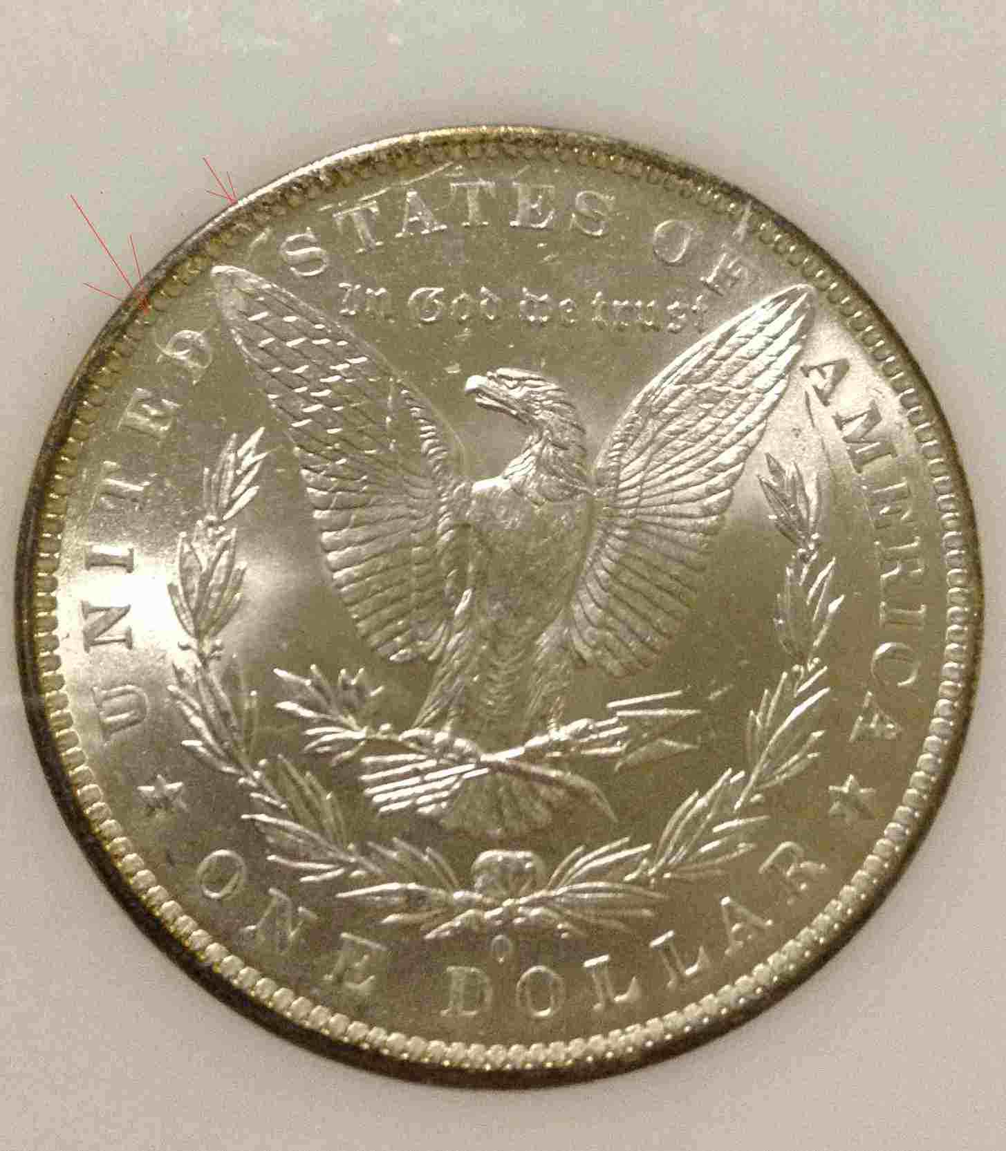 Morgan-Dollar-Strike-Through-And-Missing-Portion-Of-E?