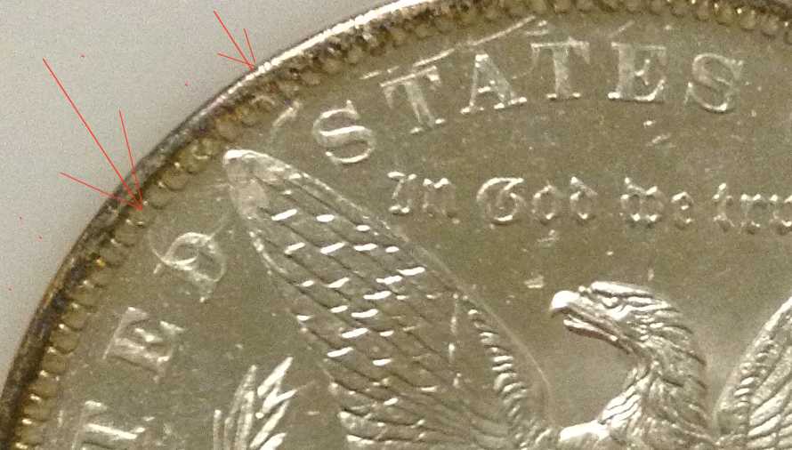 Morgan-Dollar-Strike-Through-And-Missing-Portion-Of-E?
