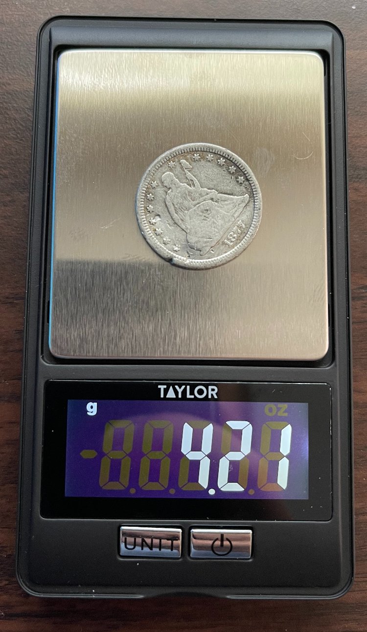 Is-This-1877-CC-Seated-Quarter-A-Counterfeit?