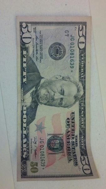 2009-50-Dollar-Star-Note.--Pink-Star-Printing-Error-On-Back?