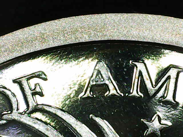2003-S-Sacagawea-Dollar-Proof-Has-Damage-On-The-First-A-In-America.-Is-This-Grease-On-The-Die?