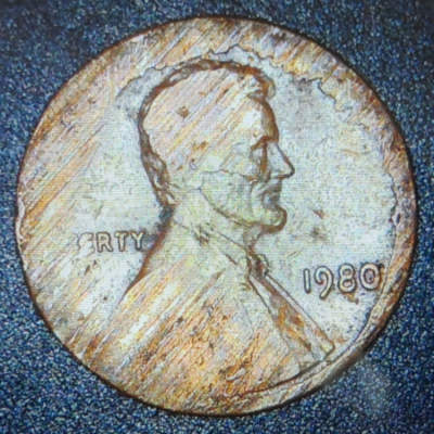 Is-This-A-Mint-Strike-Error-Or-Was-Someone-Trying-To-Create-An-Error-On-This-1980-Lincoln-Cent?