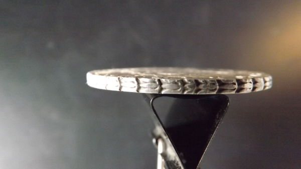 Edges-Of-Milled-Pillar-Dollars