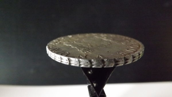 Edges-Of-Milled-Pillar-Dollars