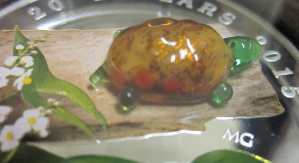 2015-Broadleaf-Arrowhead-Flower-With-Venetian-Glass-Turtle