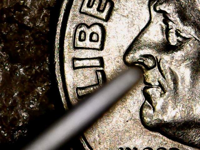2005-P-Dime-Booger-On-Nose