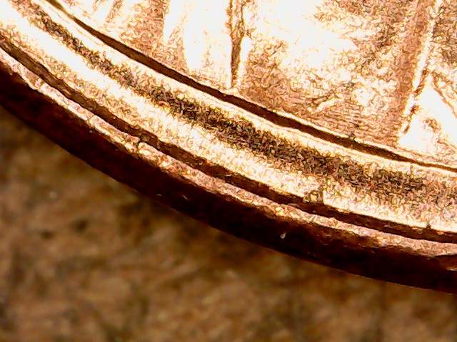 2006-Cent-Die-Crack-Looks-Rim-To-Rim