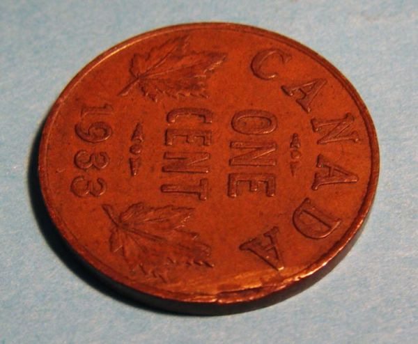 1933-George-1-Cent-Clipped-Error-?