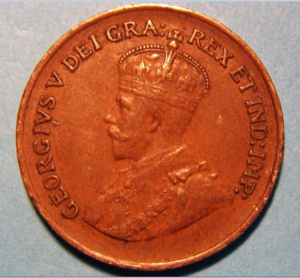 1933-George-1-Cent-Clipped-Error-?
