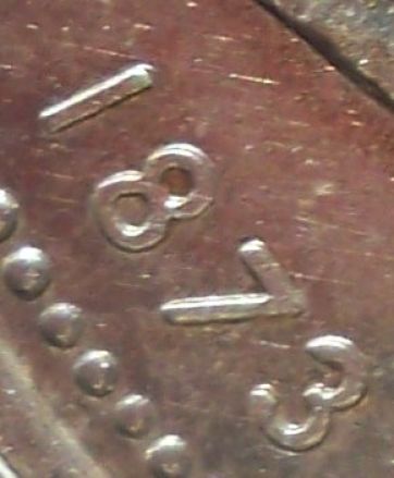 1973-Canadian-Silver-Dollar-Doubled-Date