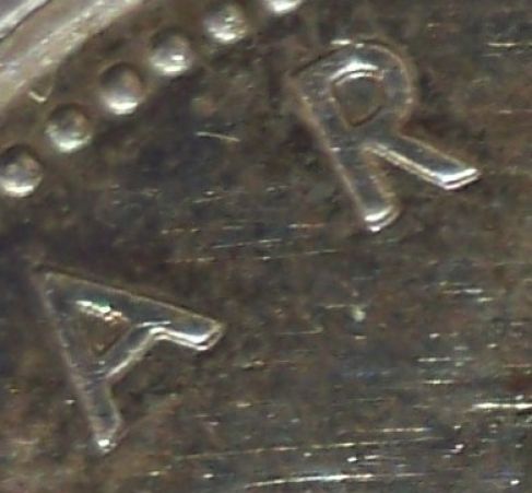 1973-Canadian-Silver-Dollar-Doubled-Date