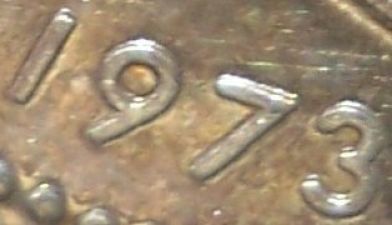 1973-Canadian-Silver-Dollar-Doubled-Date