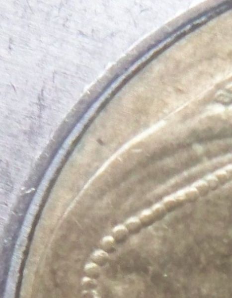 2009-Toonie-Off-Center