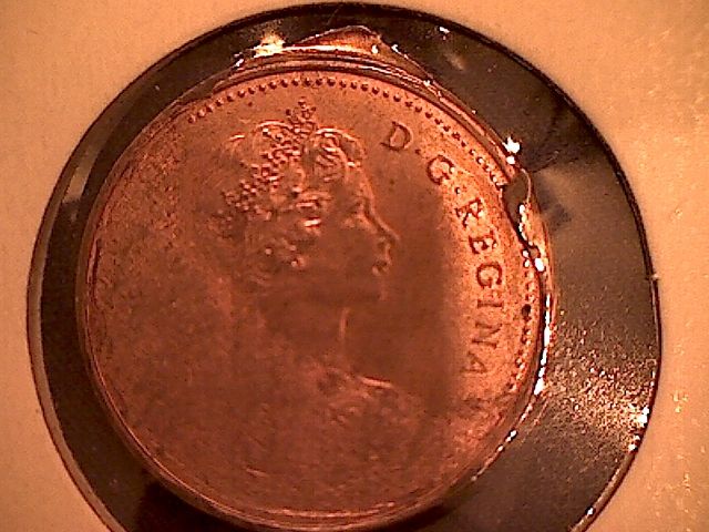 1980-Penny-Struck-Through-Struck-Coin