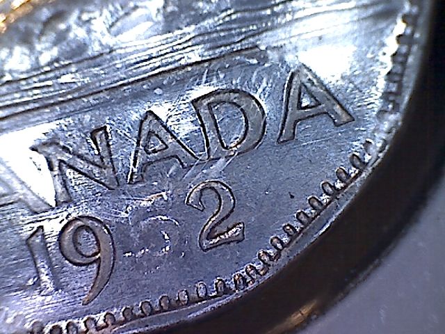 1952-Nickel-5-Missing-.-Is-This-Also-Struck-Through-Grease-?