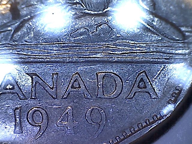 1949-Nickel-With-What-Looks-Like-Triple-A-In-Canada