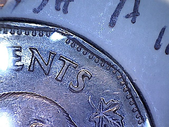 1949-Nickel-With-What-Looks-Like-Triple-A-In-Canada