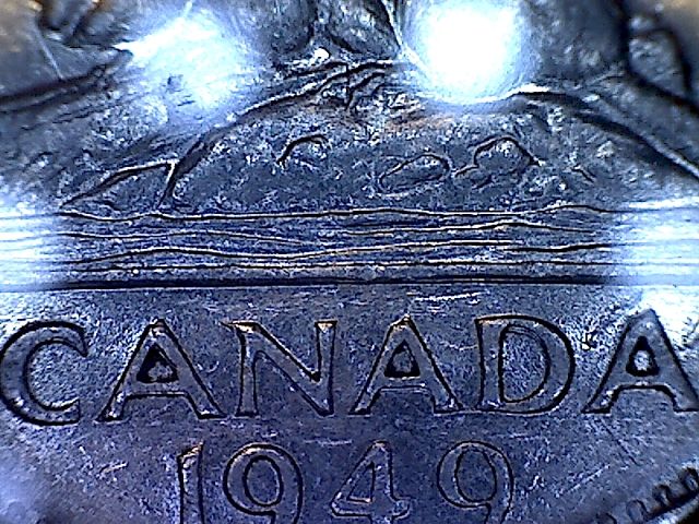 1949-Nickel-With-What-Looks-Like-Triple-A-In-Canada