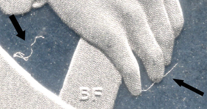 Presidential-Wilson-Dollar-/-Saratoga-Quarter-Strike-Through
