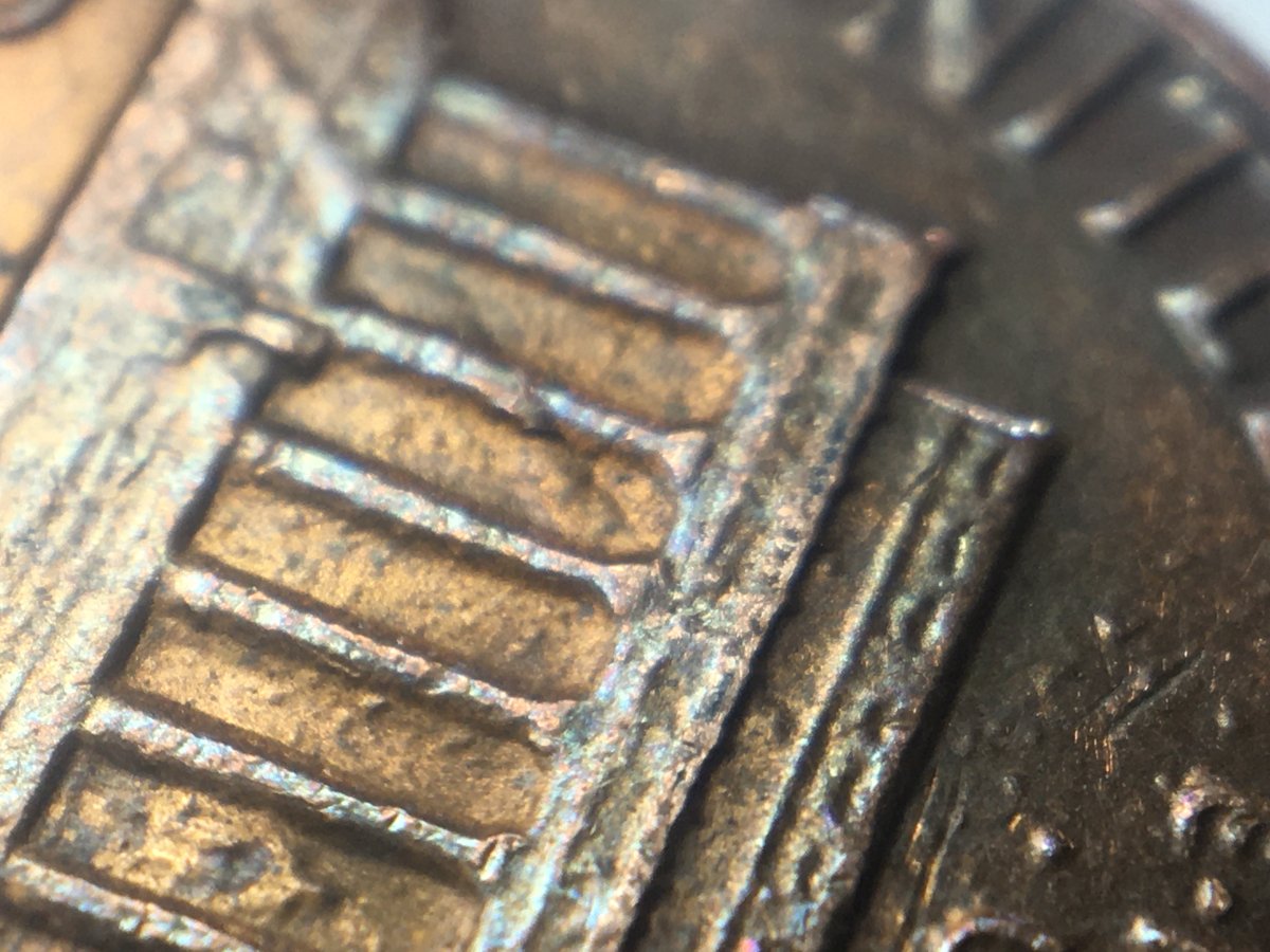 1984-D-Reverse-Strange-Raised-Line-Going-Across-Diagonally