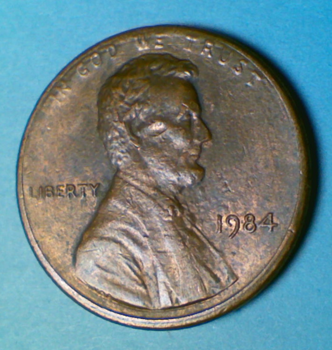 1984-Penny-With-Divit-In-Cheek