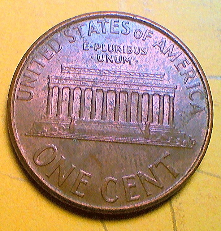 2006-Penny-With-Possible-Die-Chips-And-Blister-In-L-Obverse