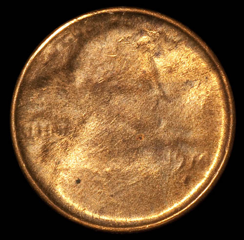 1974-Error-Cent---Struck-Through-A-Capped-Die?
