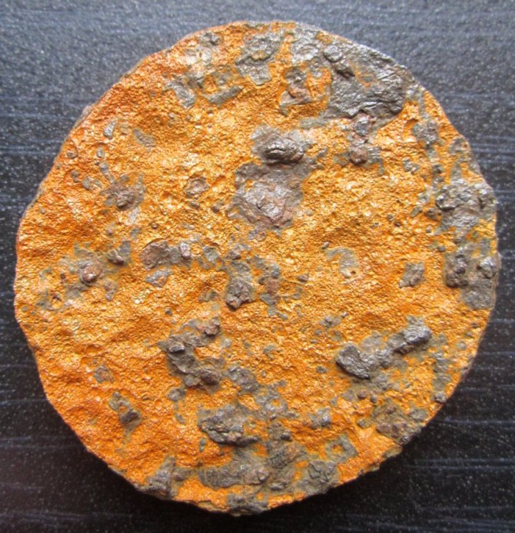 What's-Round-And-Rusted-4.5-Cm-Across-And-Weighs-32.7-Grams?