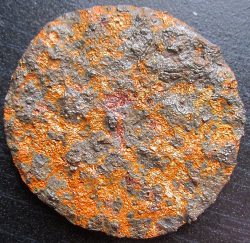 What's-Round-And-Rusted-4.5-Cm-Across-And-Weighs-32.7-Grams?