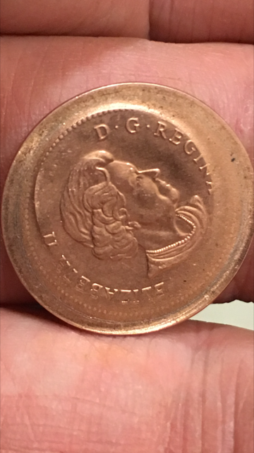 What-Do-You-Think-About-This-Really-Odd-Canada-Error-1964-Penny?