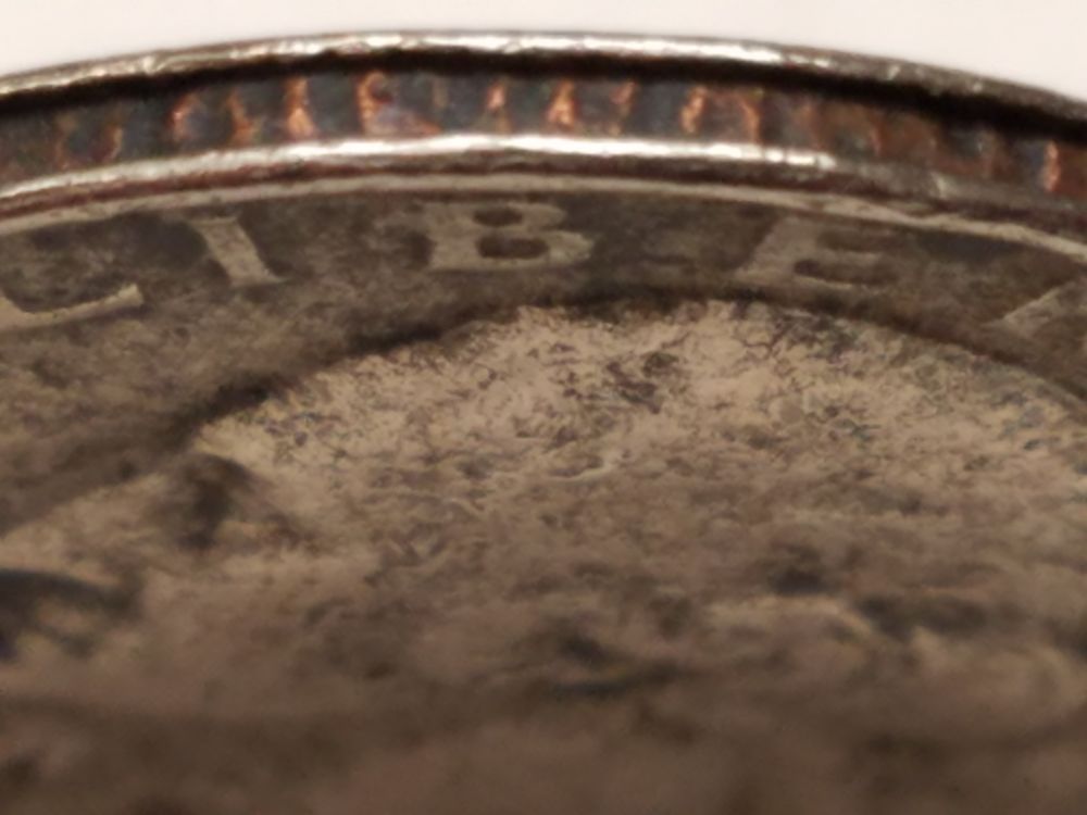 1974-Quarter-No-Mint-Mark-Edge-Lines-Pushed-In.-Is-This-Error-Coin?