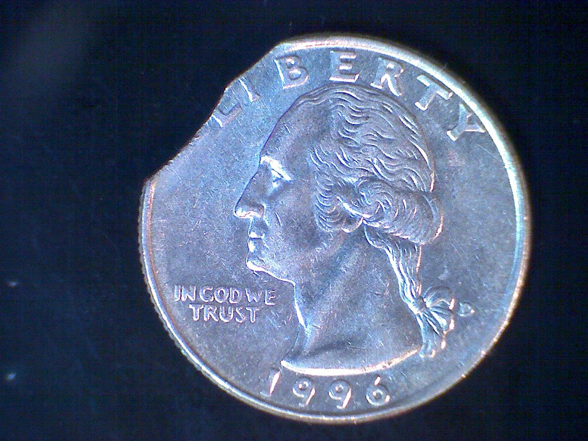 1996-Quarter,-Looks-Like-2-Curved-Clips-In-Same-Clip